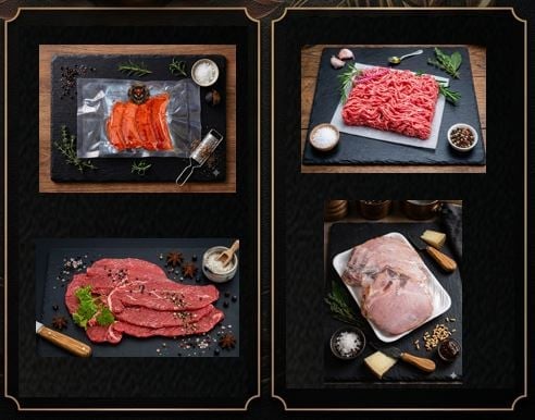 Collection of raw meat cuts including salmon, ground beef, beef steaks, and pork arranged on dark surfaces with seasoning and cooking utensils